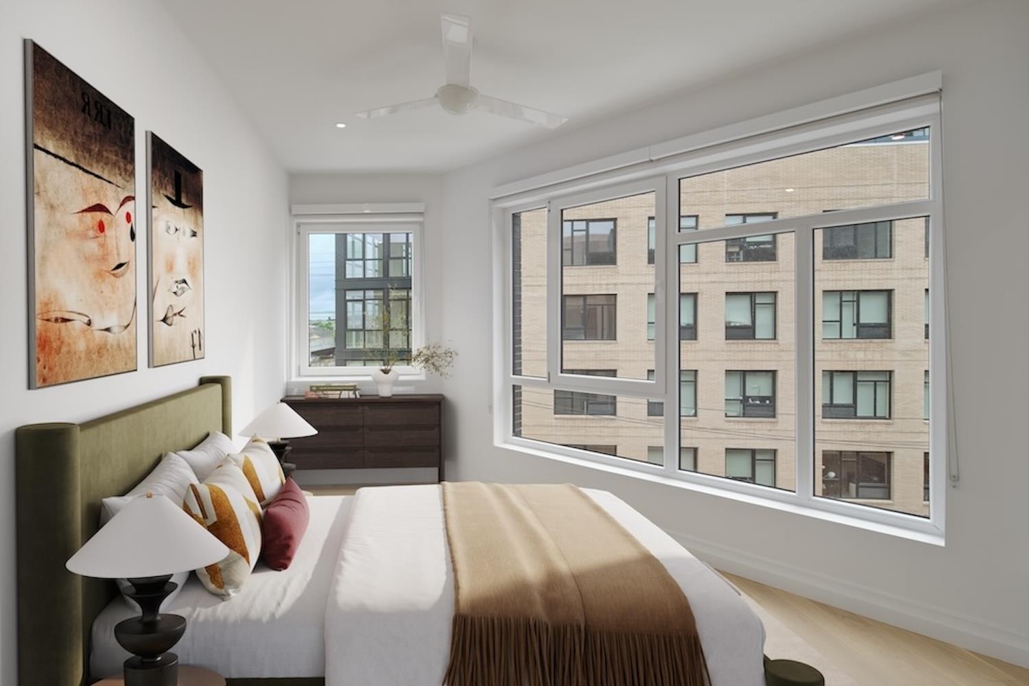 Bedroom with walk-in closet behind sliding mirror doors